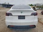 2023 Tesla Model Y Белый vin: 7SAYGDEEXPA149019