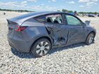 2023 Tesla Model Y Серый vin: 7SAYGDEEXPF619620