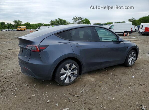 7SAYGDEEXPF882643 2023 TESLA MODEL Charcoal Trasero derecho