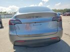 2024 Tesla Model Y Gray vin: 7SAYGDEEXRA320838