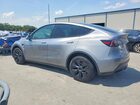 2024 Tesla Model Y Gray vin: 7SAYGDEEXRA320838