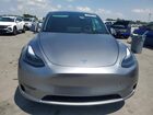 2024 Tesla Model Y Gray vin: 7SAYGDEEXRA320838