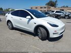 2024 Tesla Model Y Long Range Dual Motor All-wheel Drive White vin: 7SAYGDEEXRF004133