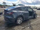 2024 Tesla Model Y Серый vin: 7SAYGDEEXRF062310