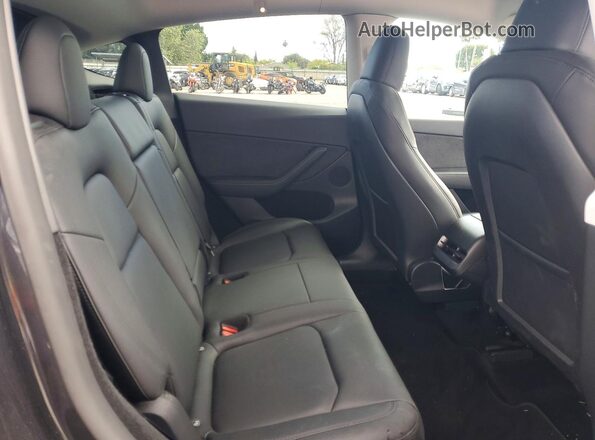 7SAYGDEEXRF062310 2024 TESLA MODEL Серый Вид задней части салона