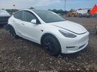 2025 Tesla Model Y Long Range Dual Motor All-wheel Drive White vin: 7SAYGDEEXSF244370