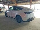 2026 Tesla Model Y White vin: 7SAYGDEEXTF412767
