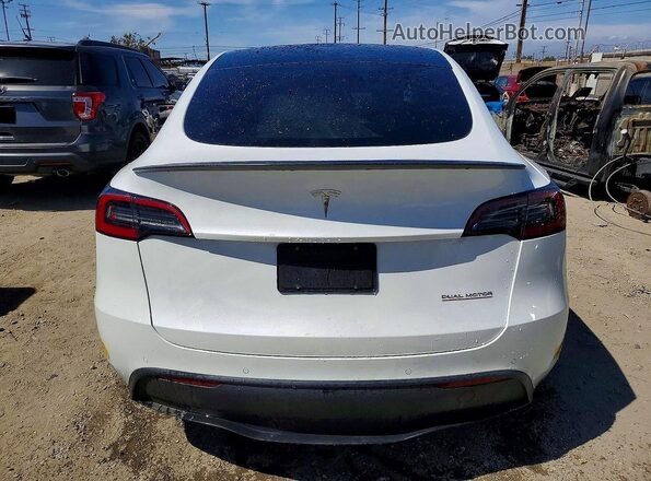 7SAYGDEF0NF397305 2022 TESLA MODEL White Հետևի տեսք