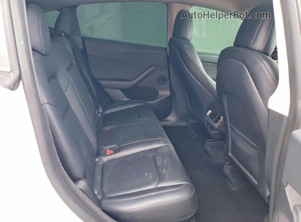 7SAYGDEF1PF596740 2023 TESLA MODEL White Rear seats view