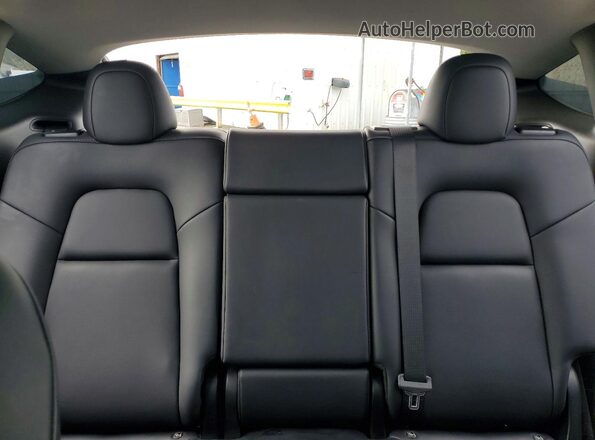 7SAYGDEF2NF326512 2022 TESLA MODEL Black Vista de los asientos traseros
