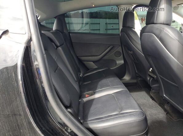 7SAYGDEF2NF326512 2022 TESLA MODEL Black Vista interior trasera