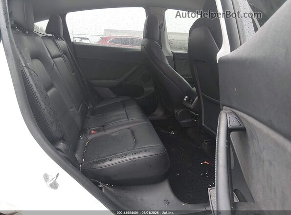 7SAYGDEF2NF564568 2022 TESLA MODEL Y White VIN კოდის სტიკერის ხედი