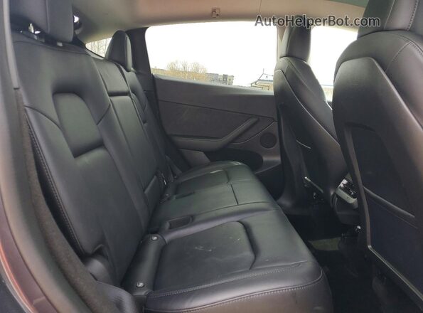 7SAYGDEF4NF559713 2022 TESLA MODEL Gray Rear interior view