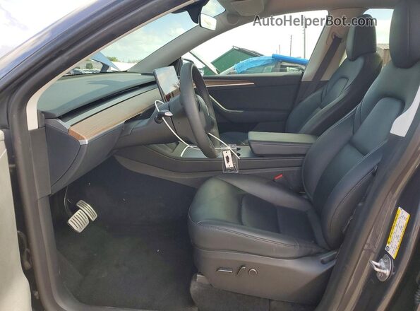 7SAYGDEF4PF911501 2023 TESLA MODEL Gray Front interior view