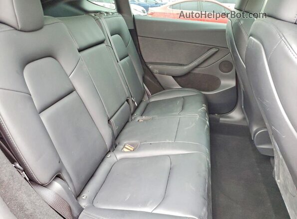 7SAYGDEF5RF033449 2024 TESLA MODEL Красный Вид задних сидений