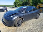 2024 Tesla Model Y Gray vin: 7SAYGDEF6RF037378