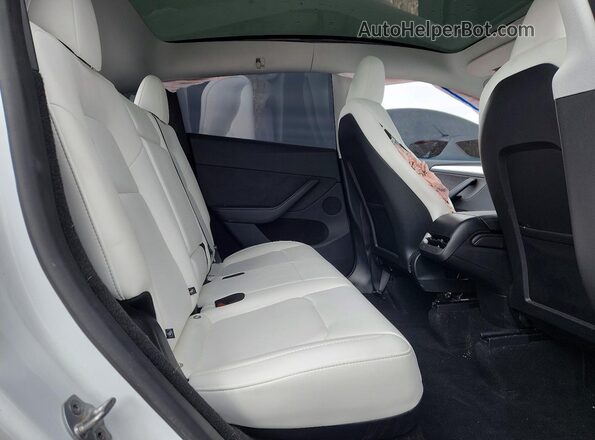 7SAYGDEF6SA353611 2025 TESLA MODEL White Rear interior view