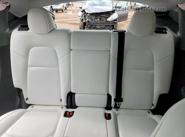 7SAYGDEF6SA353611 2025 TESLA MODEL White Rear seats view