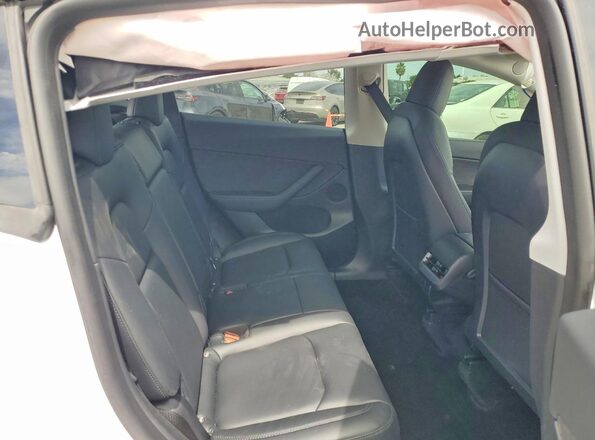 7SAYGDEF7NF486532 2022 TESLA MODEL White Вид задньої частини салону