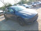 2023 Tesla Model Y Performance Dual Motor All-wheel Drive Gray vin: 7SAYGDEF7PF910536