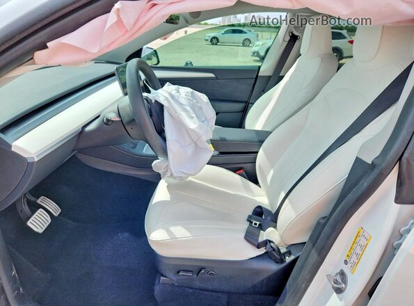 7SAYGDEF7SA339894 2025 TESLA MODEL White Front interior view