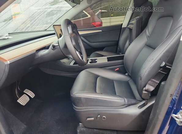 7SAYGDEF7SA342679 2025 TESLA MODEL Blue Front interior view