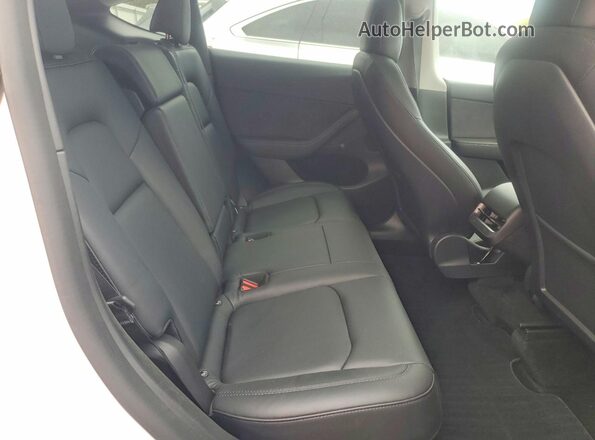 7SAYGDEF8NF520512 2022 TESLA MODEL White Vista de los asientos traseros
