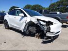 2023 Tesla Model Y Performance Dual Motor All-wheel Drive White vin: 7SAYGDEF8PF782615