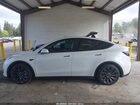 2023 Tesla Model Y Performance Dual Motor All-wheel Drive White vin: 7SAYGDEF9PF834172
