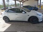 2023 Tesla Model Y Performance Dual Motor All-wheel Drive White vin: 7SAYGDEF9PF834172