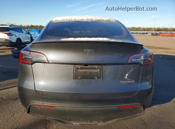 7SAYGDEF9PF860268 2023 TESLA MODEL Gray Vista trasera