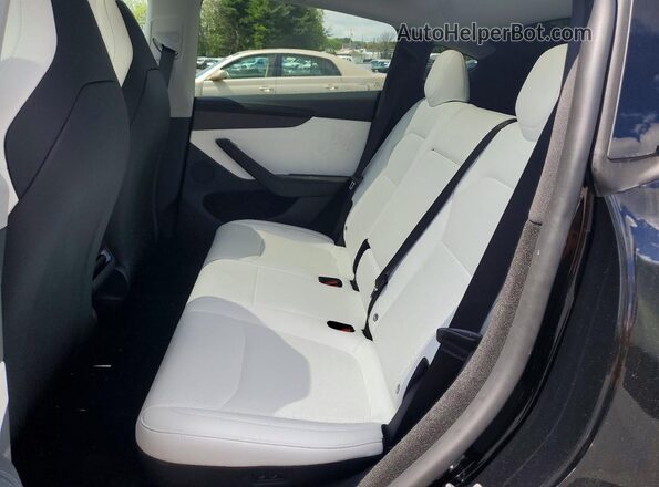 7SAYGDET9TA629092 2026 TESLA MODEL Black Vista de los asientos traseros