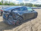 2026 Tesla Model Y Black vin: 7SAYGDET9TA629092