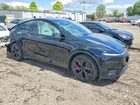 2026 Tesla Model Y Black vin: 7SAYGDET9TA629092