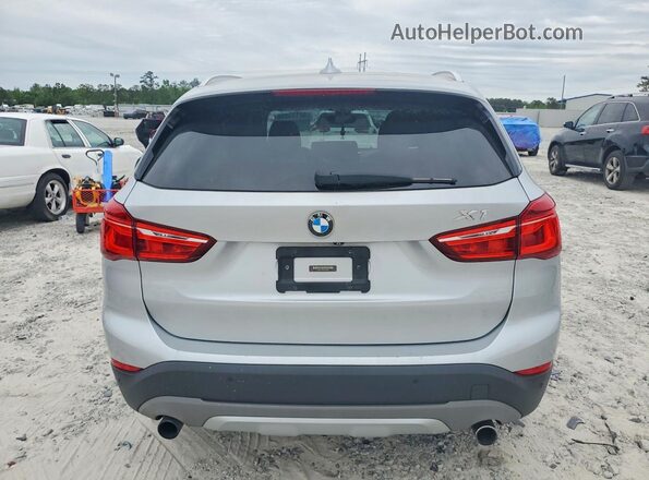 WBXHT3Z30G4A50978 2016 BMW X1 Silver Вид салону спереду