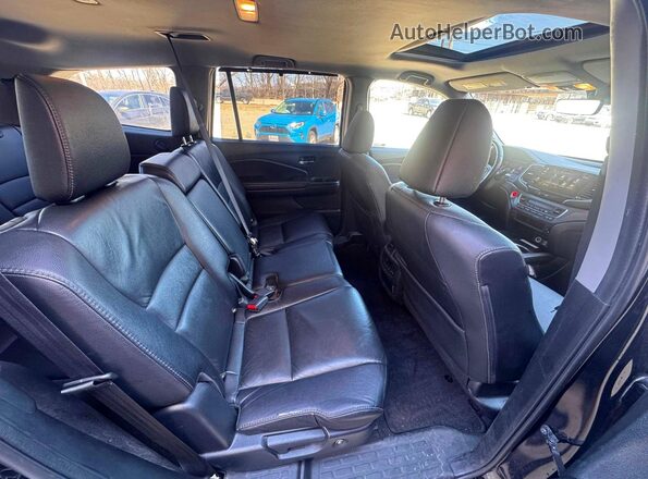 5FNYF6H24MB096457 2021 HONDA PILOT Черный Вид салона спереди
