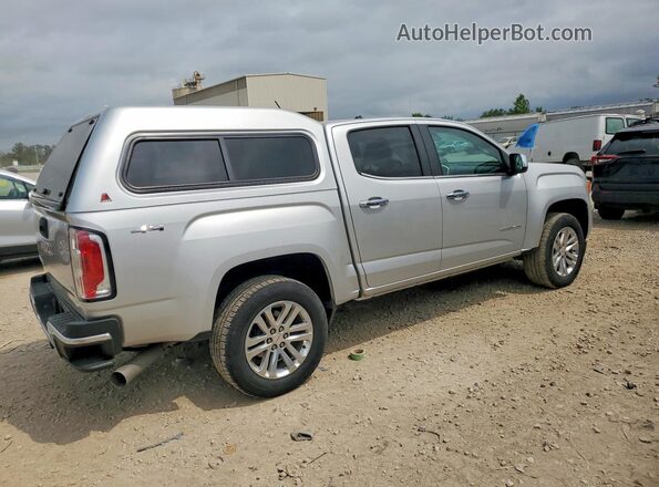 1GTP6DE16J1243605 2018 GMC CANYON Серебряный Передняя правая четверть