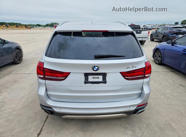 5UXKT0C52J0W00459 2018 BMW X5 Серебряный Вид салона спереди