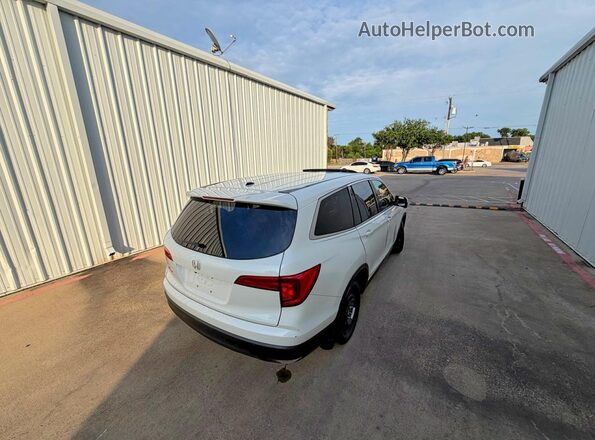 5FNYF5H57JB009487 2018 HONDA PILOT Белый Вид спереди