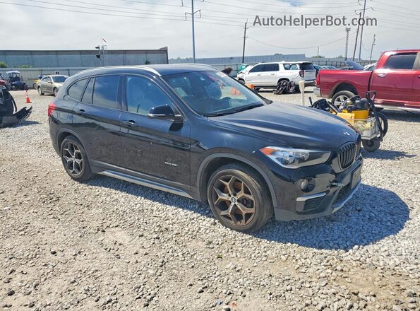 WBXHT3C33J5K29491 2018 BMW X1 Black Front view