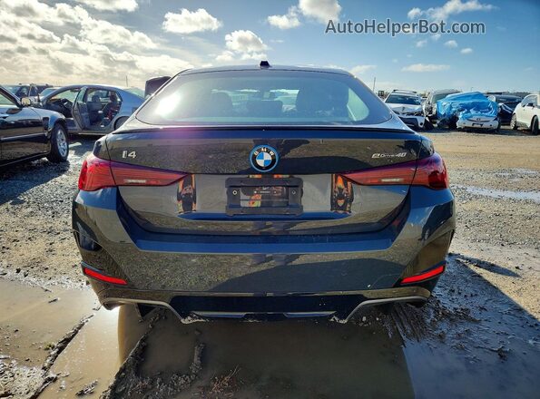 WBY23HD03SFV64510 2025 BMW I4 Серый Вид салона спереди