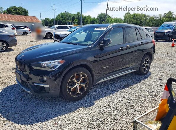 WBXHT3C33J5K29491 2018 BMW X1 Black Rear left