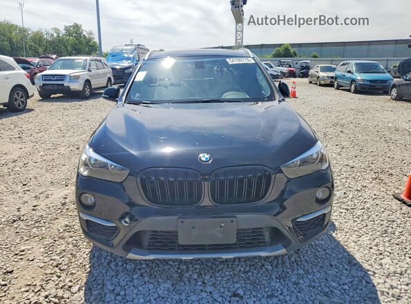 WBXHT3C33J5K29491 2018 BMW X1 Black Rear view