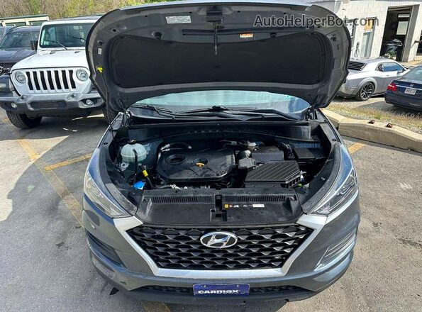 KM8J3CA47MU287099 2021 HYUNDAI TUCSON Серый Вид салона спереди