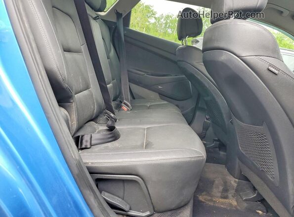 KM8J33A29JU708878 2018 HYUNDAI TUCSON Blue Widok wnętrza z tyłu