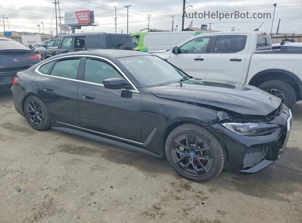 WBY43AW04RFS63784 2024 BMW I4 Black Vista frontal