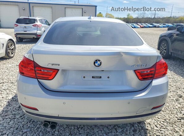 WBA4C9C50GG139788 2016 BMW OTHER Серебряный Вид салона спереди