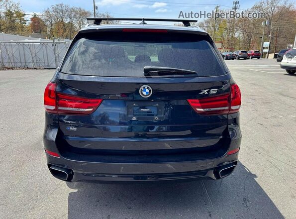 5UXKR0C56J0X92077 2018 BMW X5 Черный Вид салона спереди