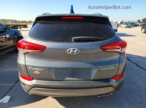 KM8J33A23GU239506 2016 HYUNDAI TUCSON Gray Vista interior delantera