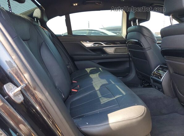 WBA7E4C51KGV28667 2019 BMW 7 SERIES Gray Widok wnętrza z tyłu